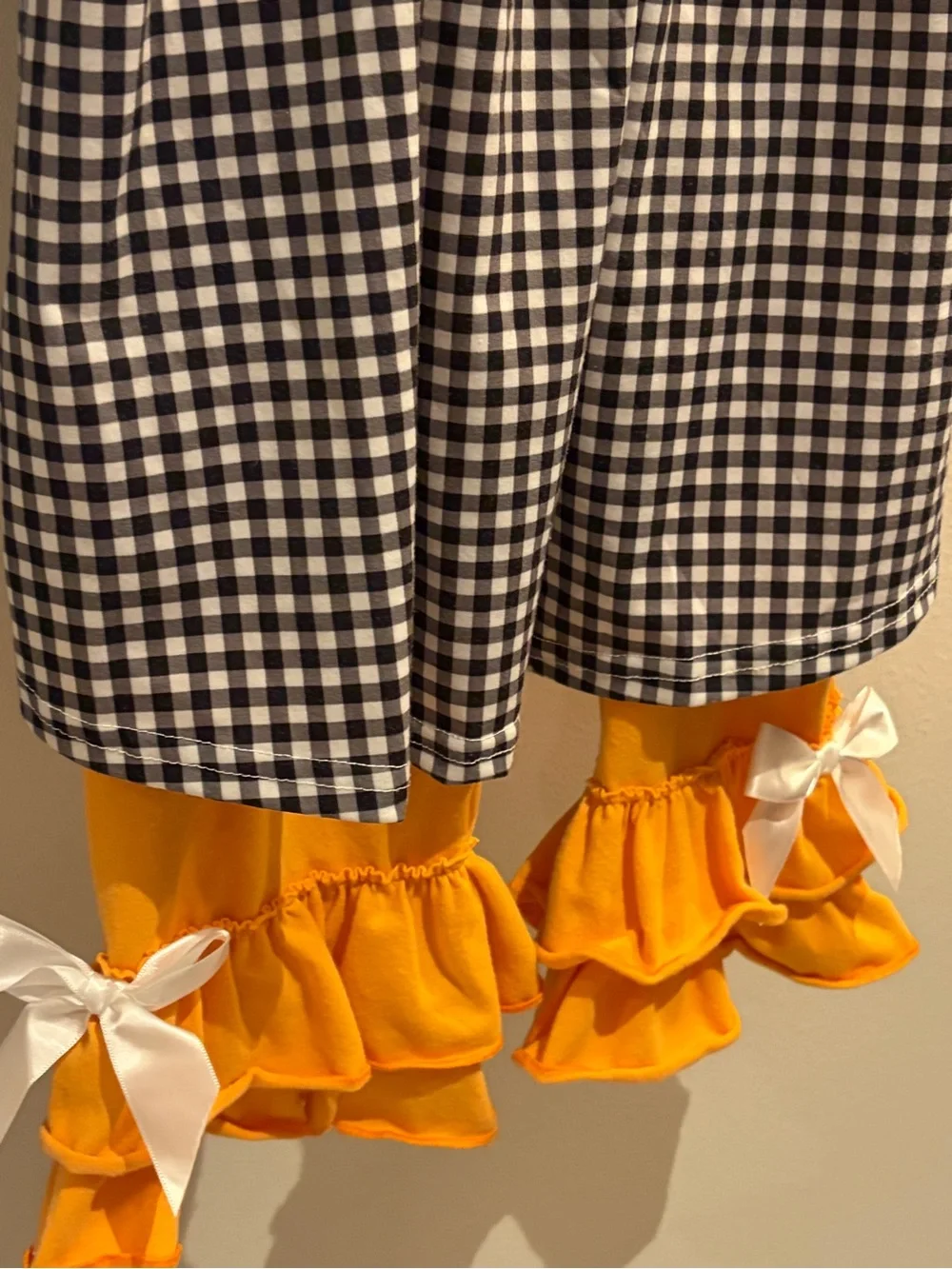 Girls Black & White Gingham Halloween Costume Dress with Orange Ruffle Pants